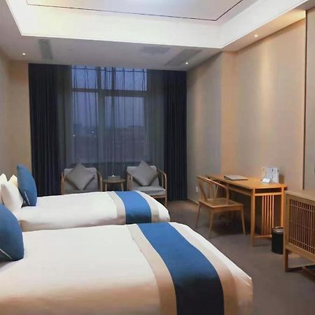 フェイチェン ブロッサム ホテル Feicheng エクステリア 写真