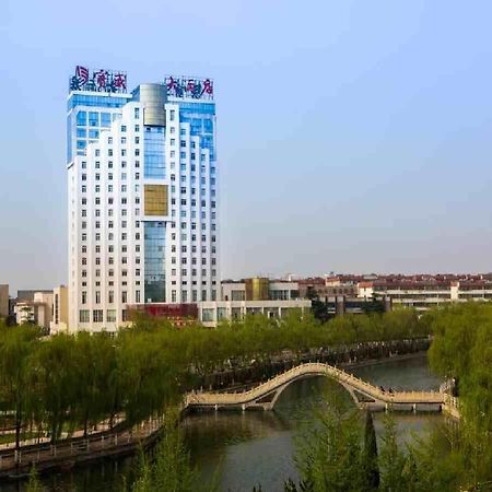 フェイチェン ブロッサム ホテル Feicheng エクステリア 写真