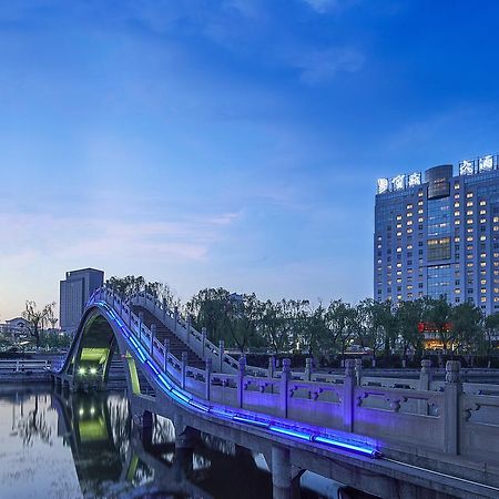 フェイチェン ブロッサム ホテル Feicheng エクステリア 写真